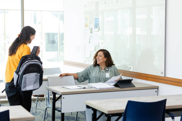 istock Female student arrives for tutoring session 1649070825