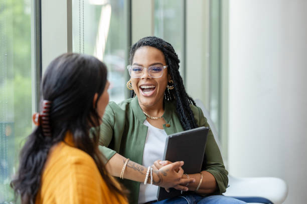 istock Counselor and patient share laugh during session 1649072444
