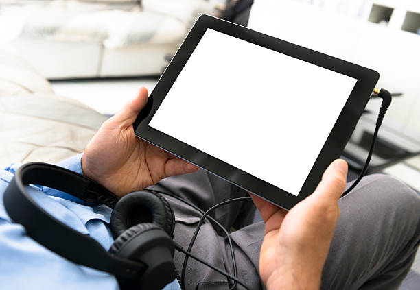 istock Man listening music with a digital tablet 164907541