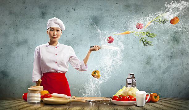 istock Asian female cook with knife 164908497