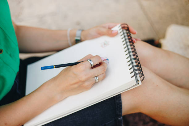istock Woman drawing outdoors stock photo 1649102225