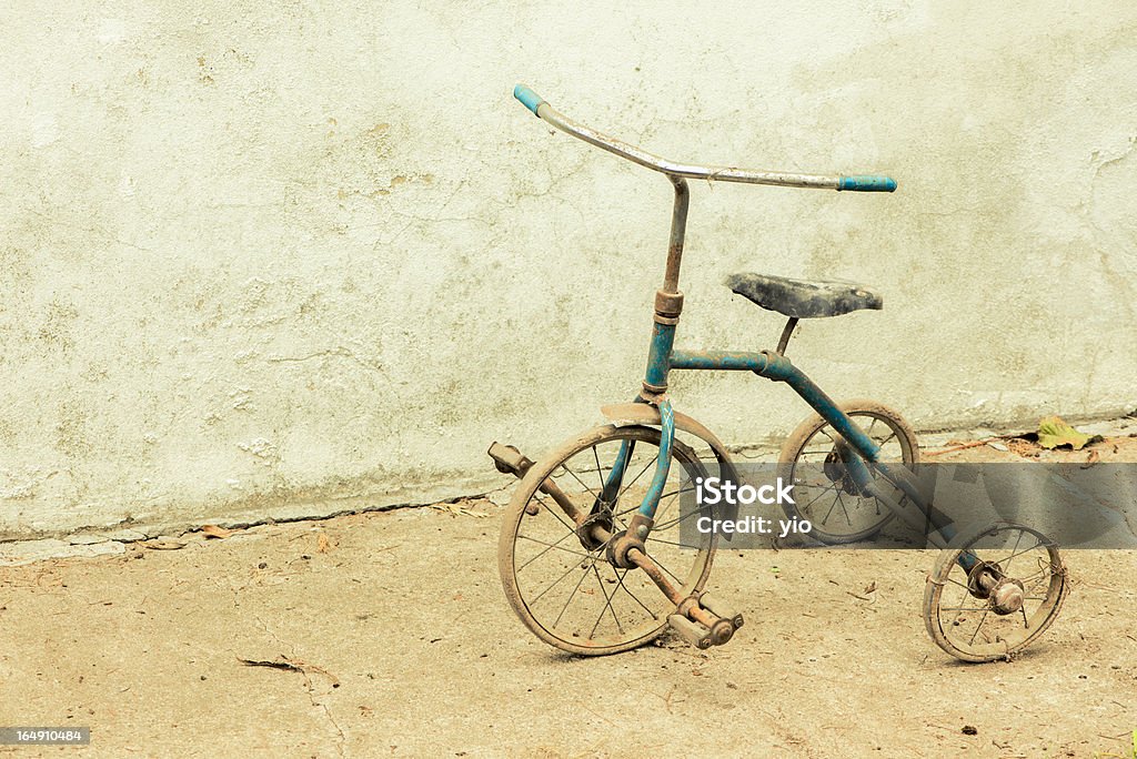 Old Rickety Tricycle An old and rusty tricycle Bicycle Stock Photo