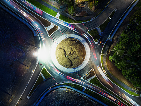 Aerial view of a newly constructed roundabout at night.