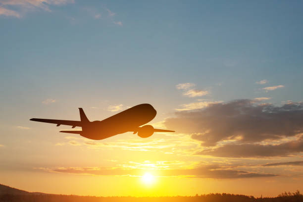 istock Airplane taking off at the sunset sky. 1649162201