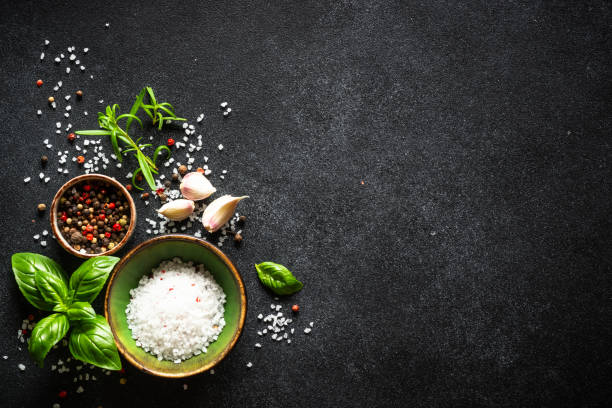 istock Food cooking background on black stone table. 1649171183
