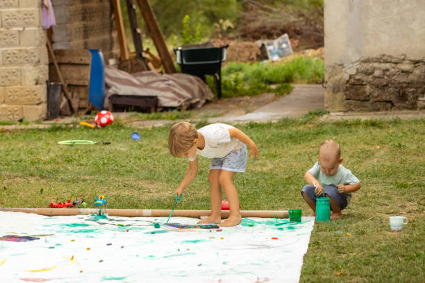istock Children being creative in the backyard 1649175456