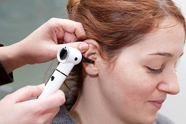 istock ear exam with otoscope 164922006