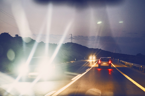 Night traffic on highway in a remote location in Izmir, Turkiye.