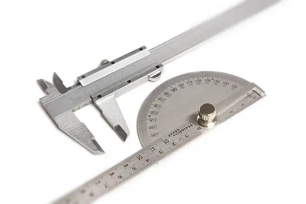 Measurement tools vernier calipers and protractor isolated on white