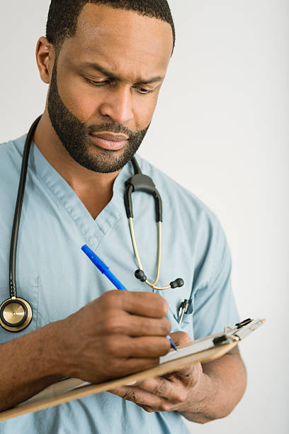 istock Doctor Writing Prescription 164923145