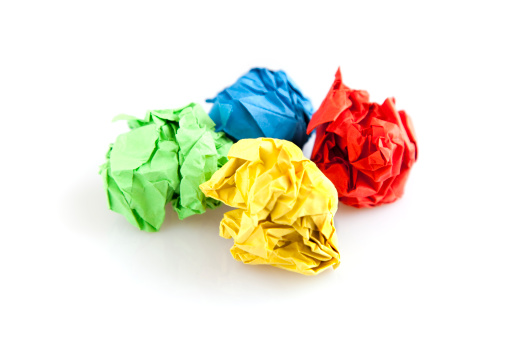 Crumpled paper ball: blue, red, green, yellow.