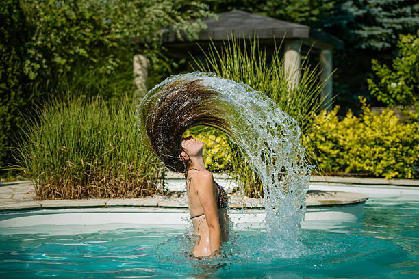 Girl playing in the water.
