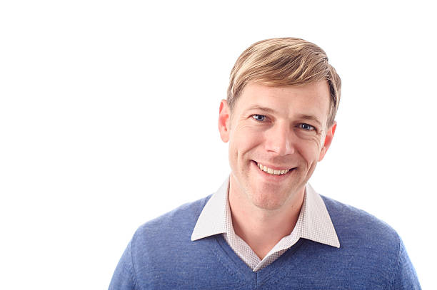istock Man wearing a blue jumper and white shirt 164923619