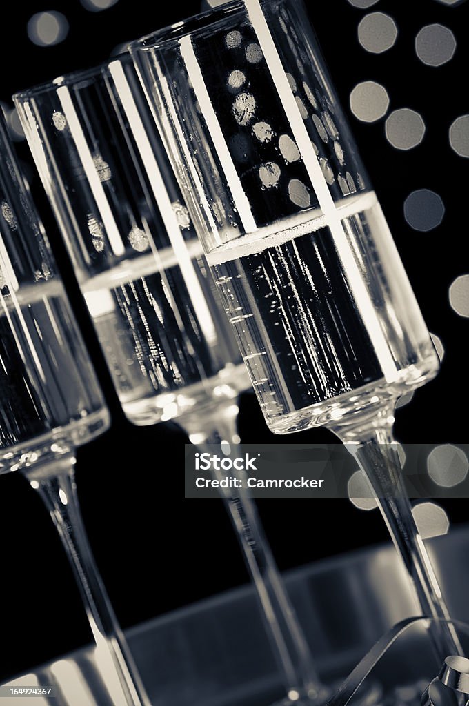 Champagne Celebration Glasses of champagne on a tray at a new years party.  Alcohol - Drink Stock Photo