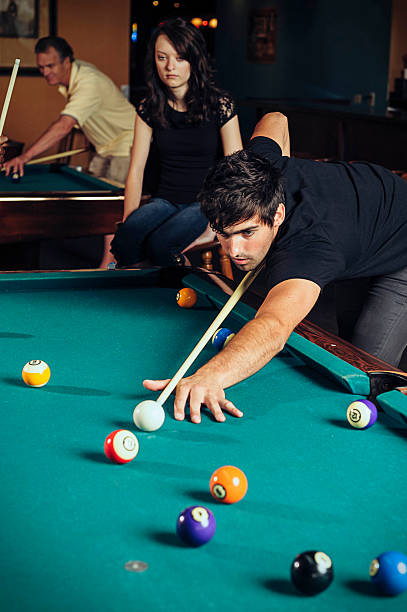 Friends Playing Pool stock photo