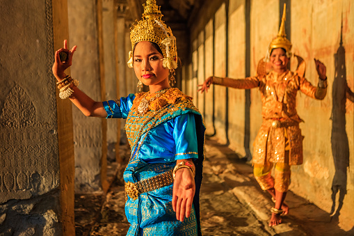 A women shows Apsara dance in old ruins near Siem Reap, Cambodia.