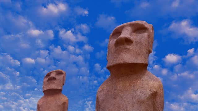 Eastern Islands statues with time lapse clouds
