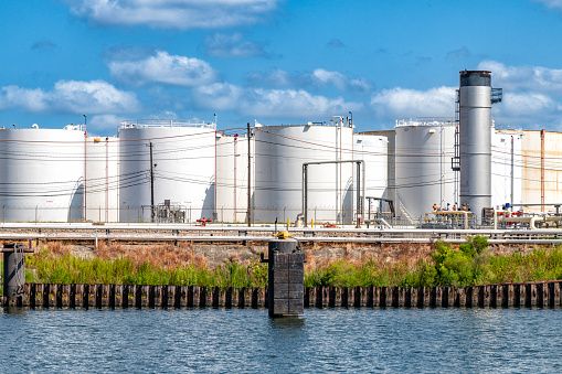 A large group of fuel storage tanks near refineries along the Houston Ship Channel just east of downtown Houston.