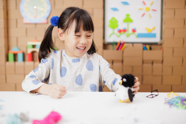 istock young girl was making craft at home 1649273692