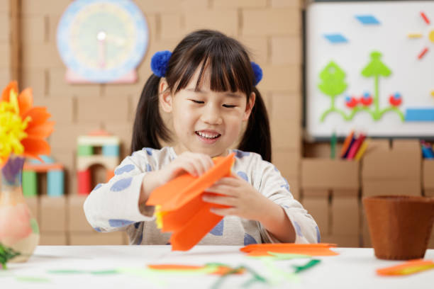istock young girl was making craft at home 1649273832