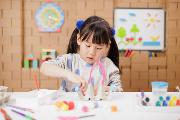 istock young girl was making craft at home 1649273923