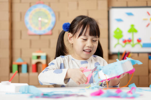 istock young girl was making craft at home 1649273997
