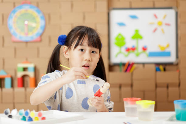 istock young girl was making craft at home 1649274519