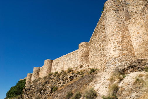 Trieste, Italy - September 26, 2023: Defense wall of medieval Castle of San Giusto, fortress located on San Giusto Hill.