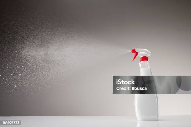 Spray Bottle Studio Shot On Gray Gradient Background Stock Photo - Download Image Now