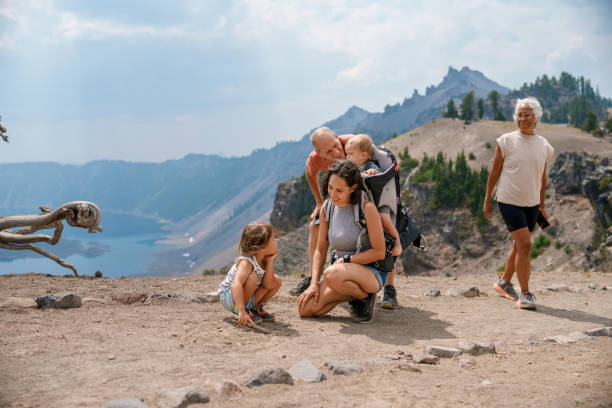 istock Multi-generation family on nature hike 1649297864