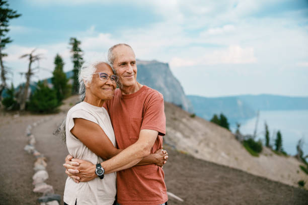 istock Happy retired couple enjoying nature 1649298427