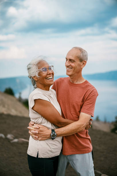 Joyful retired couple hiking