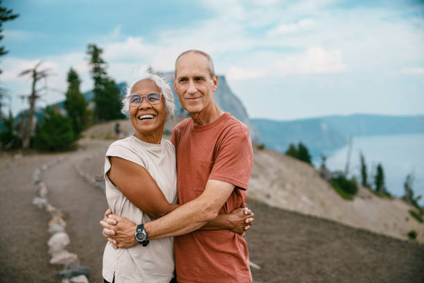 istock Happy retired couple enjoying nature 1649298445