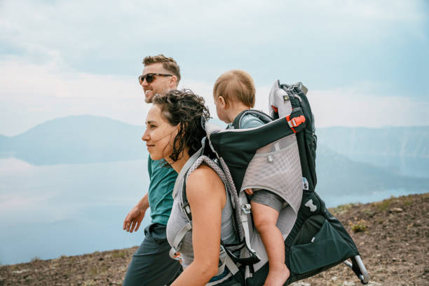 istock Active couple hiking with their baby 1649298479