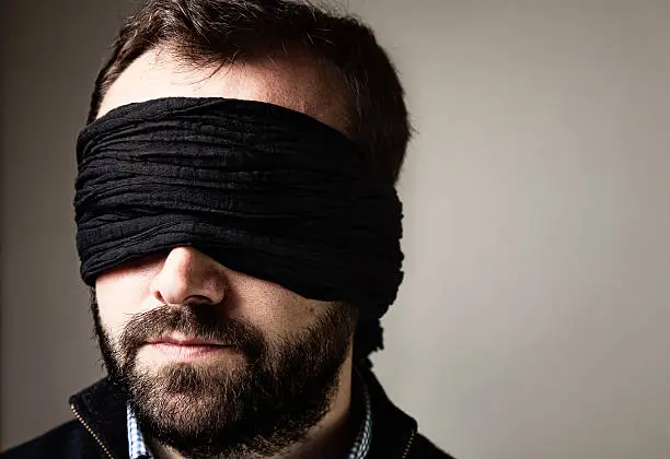 Blindfolded man portrait