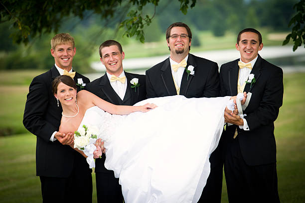 istock Groomsmen and Groom Take a Fun Portrait with Bride 164933052