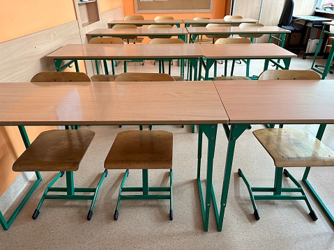 Empty classroom with green clean board