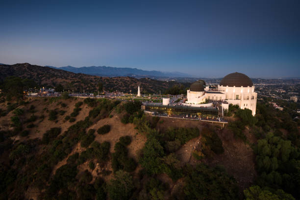 Aerial shot of Griffith Park in Los Angeles, California at twilight.