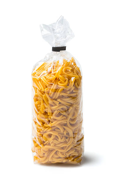 A bag of pasta on a white background stock photo
