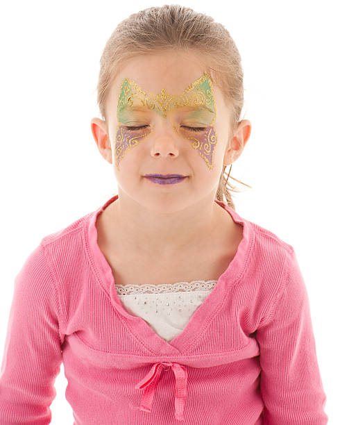 istock Young girl show's off painted face 164941915
