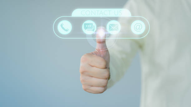 istock User touching on virtual screen contact icons ( email, address, live chat, telephone ). Customer service, helpdesk advice online support. Contact us or Customer support hotline. 1649449193