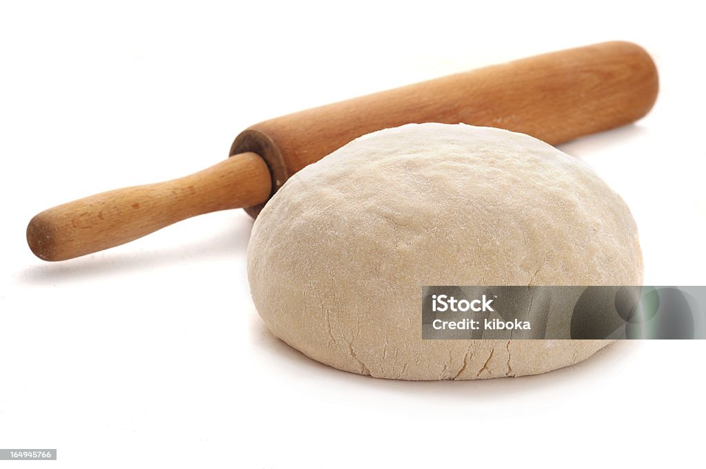 ball of dough ball of dough and rolling pin over white background Baked Pastry Item Stock Photo