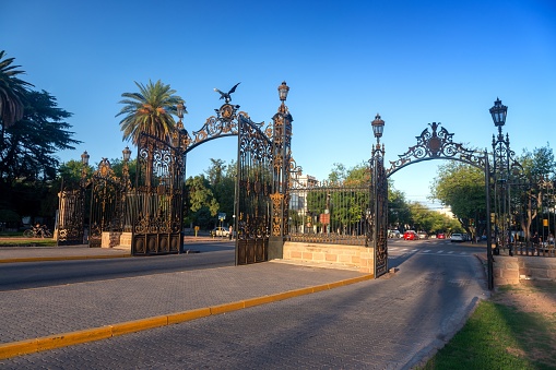Mendoza, Argentina - March 24, 2023:  Main Entrance Gates of Famous General San Martin Park, decorated with Coat of Arms and Condor with Wings Stretched Wide