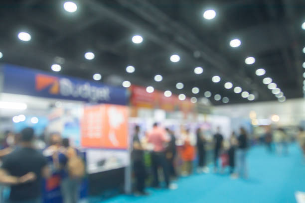 istock Abstract people walking in exhibition blurred background 1649539336