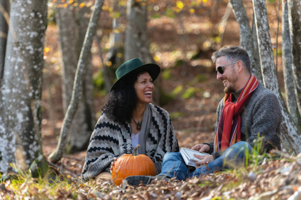 Couple sitting in nature.