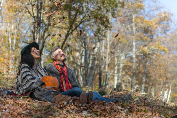 istock Couple sitting in nature. 1649551435
