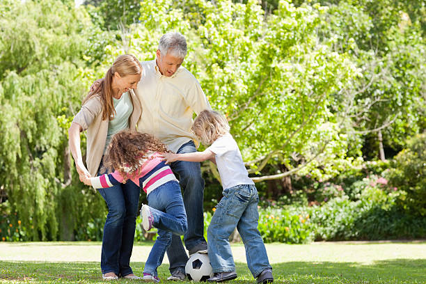 istock Family playing football 164962912