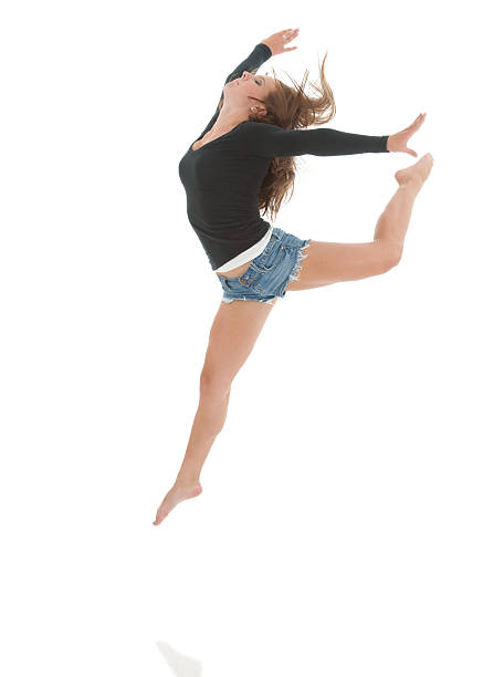 istock Experienced female gymnast does a sheep jump (isolated) 164963568