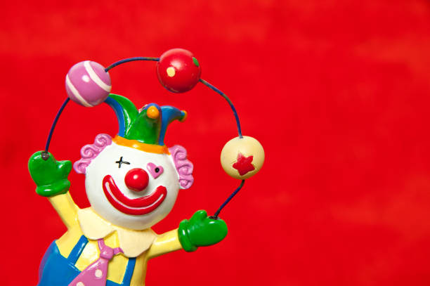 istock Toy Clown on Red Background 164967645