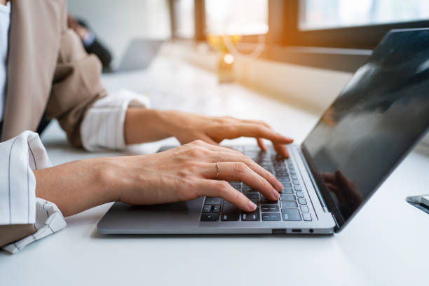 istock Business woman manager executive looking at laptop computer technology in office working on digital project. 1649677641